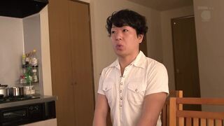 Japanese housewife with adorable facial features boned in the kitchen
