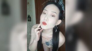 Tattooed Asian Slut Undressing And Showing Of Her Sexy Body Video