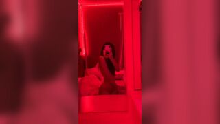 Asian Teen in a Red Room Exposing Herself Video