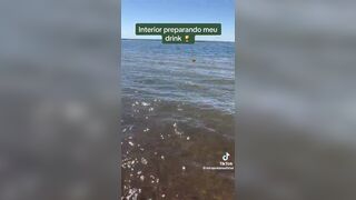 LoiraPraiana Sexy Milf Drinking While Flashing Her Tits Near Sea Tiktok Video