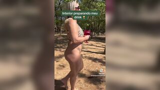 LoiraPraiana Sexy Milf Drinking While Flashing Her Tits Near Sea Tiktok Video