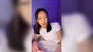 Asian Slut Sucking and Riding Dildo On Cam Video