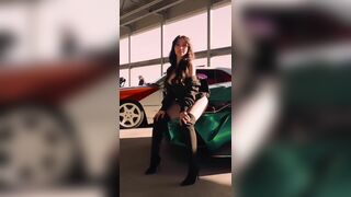 Sexy Asian Curvy Babe Shows Her Booty Cheeks In A Car Show