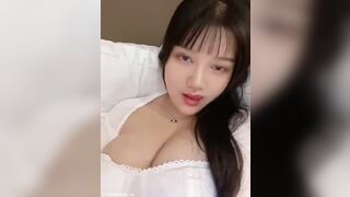 Busty Asian Flashing her Huge Tits Video