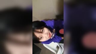 Cute Asian Girl Doing a Quick Blow In Bathroom Video