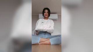 Asian Beauty Showing her Sexy Red Bra Video