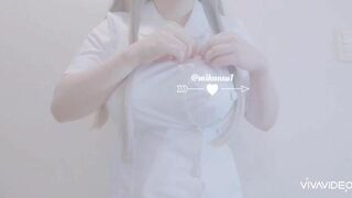 Mikansui Sexy Asian in a Nurse Kit Teasing Boobs Video