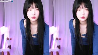 Yjk011599 in a Short Skirt Dancing and Showing off on live Video