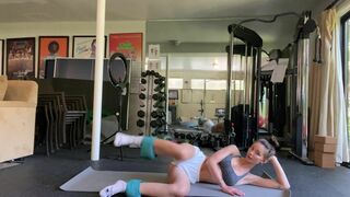 Kaile G0h Asian Stretching Out On The Floor Of The Gym Video
