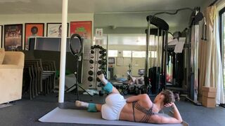 Kaile G0h Asian Stretching Out On The Floor Of The Gym Video