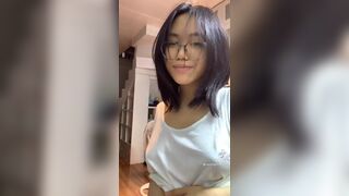 Horny Asian Girl In Glasses Showing Off Tiktok Video