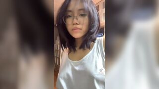 Horny Asian Girl In Glasses Showing Off Tiktok Video